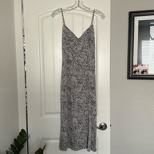 New never worn strap dress with high slit on right leg .